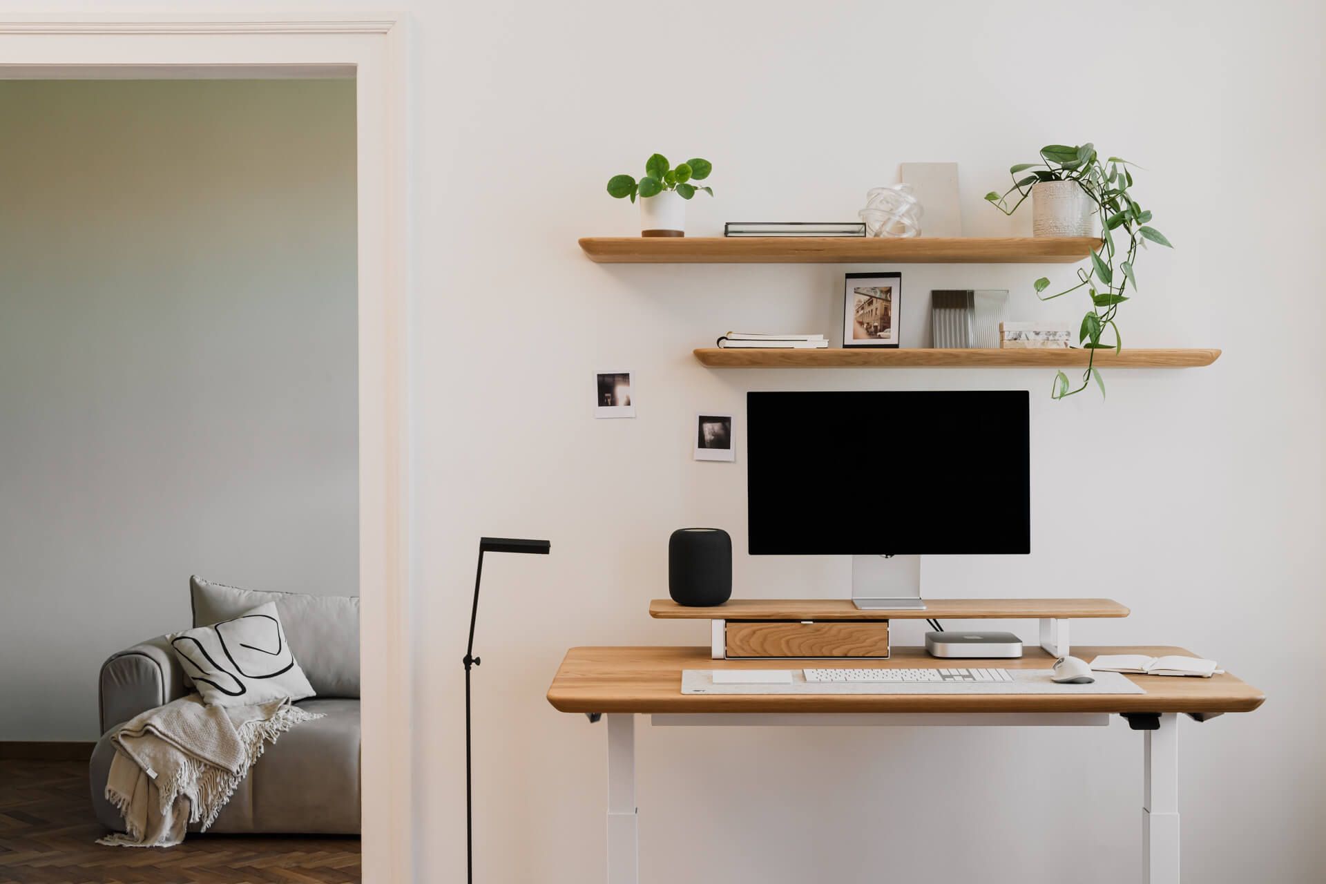 oak wooden standing desk made by oakywood with matching wall shelves and dual desk shelf with white legs front
