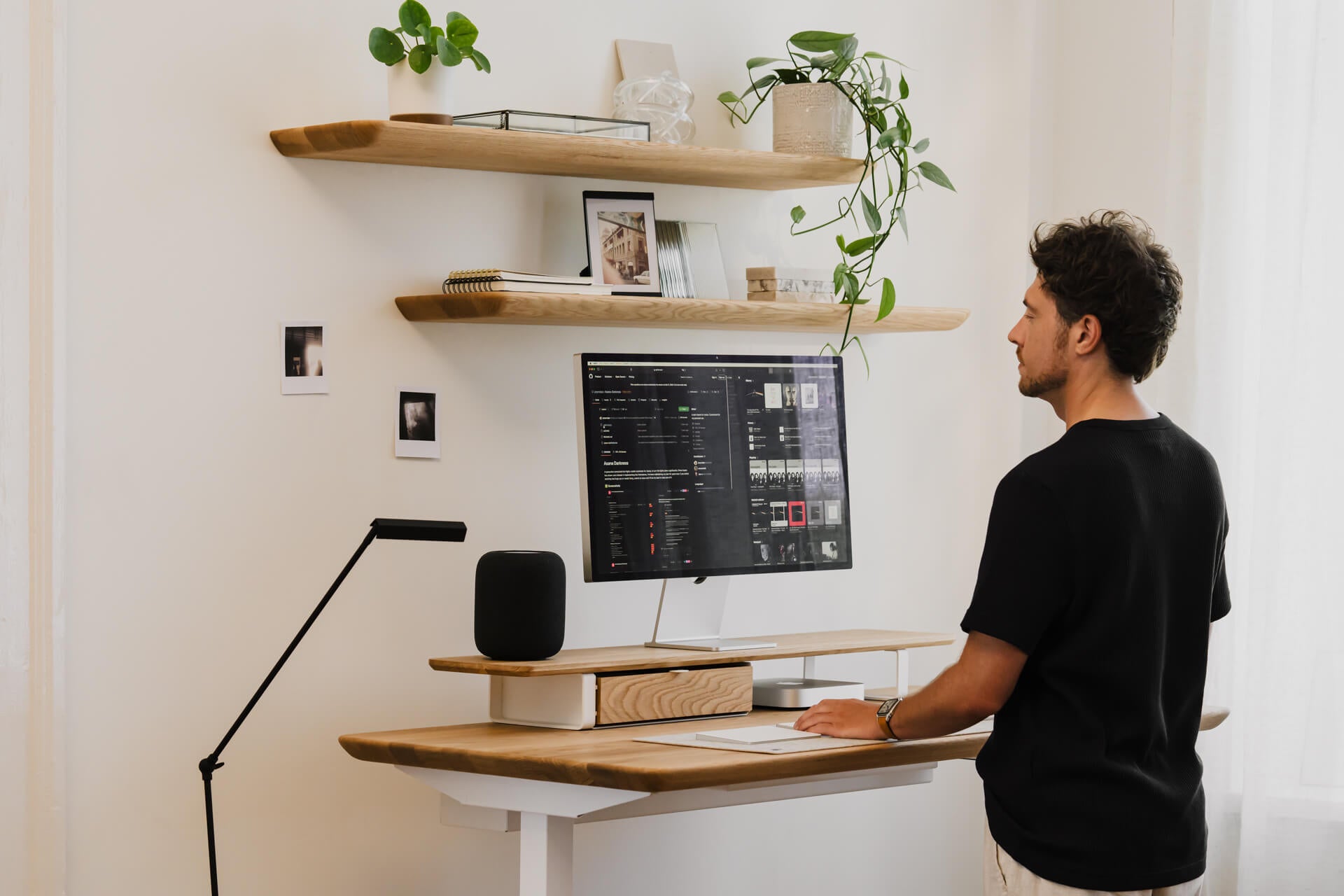 oak wooden standing desk made by oakywood with matching wall shelves and dual desk shelf with white legs