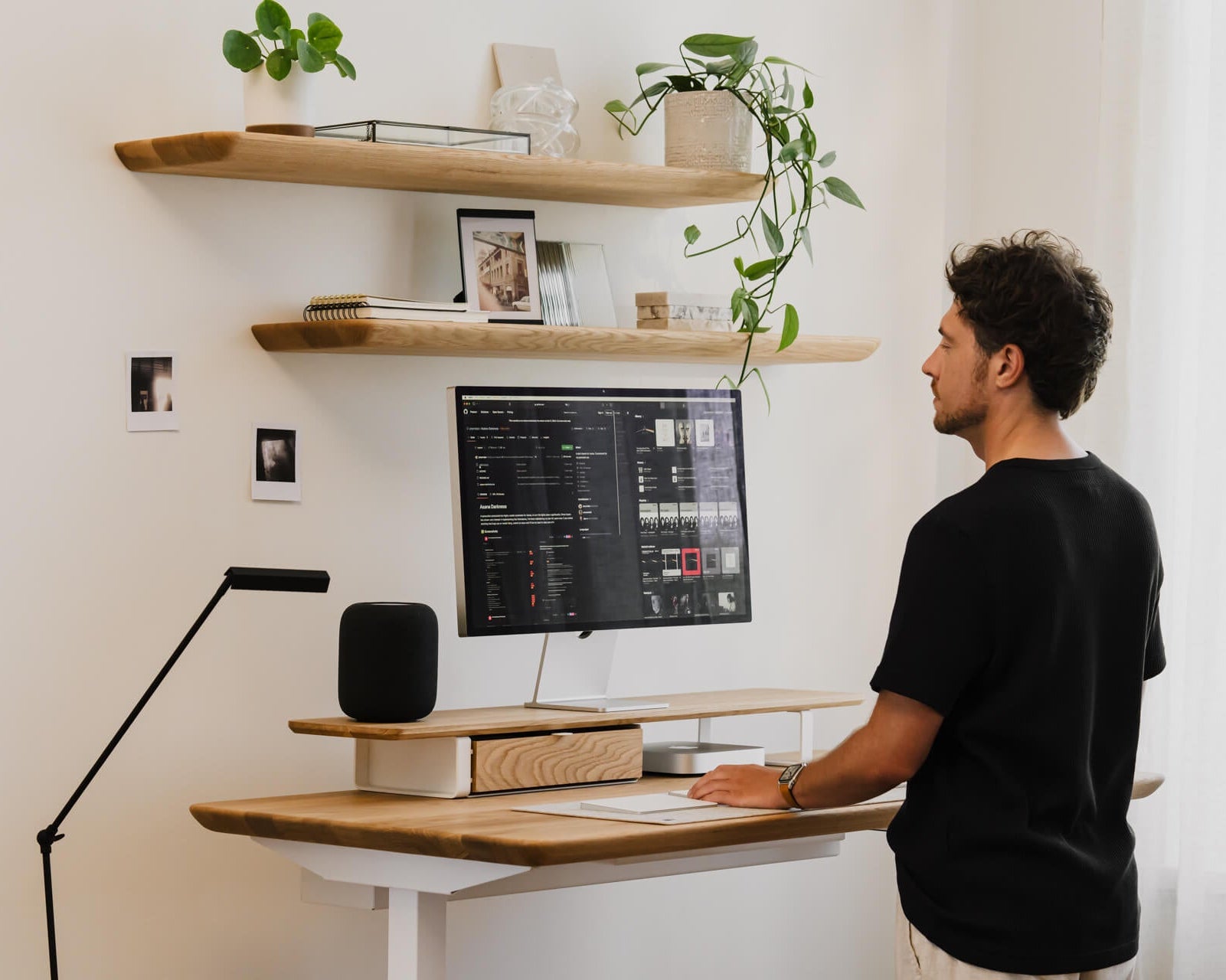 oak wooden standing desk made by oakywood with matching wall shelves and dual desk shelf with white legs